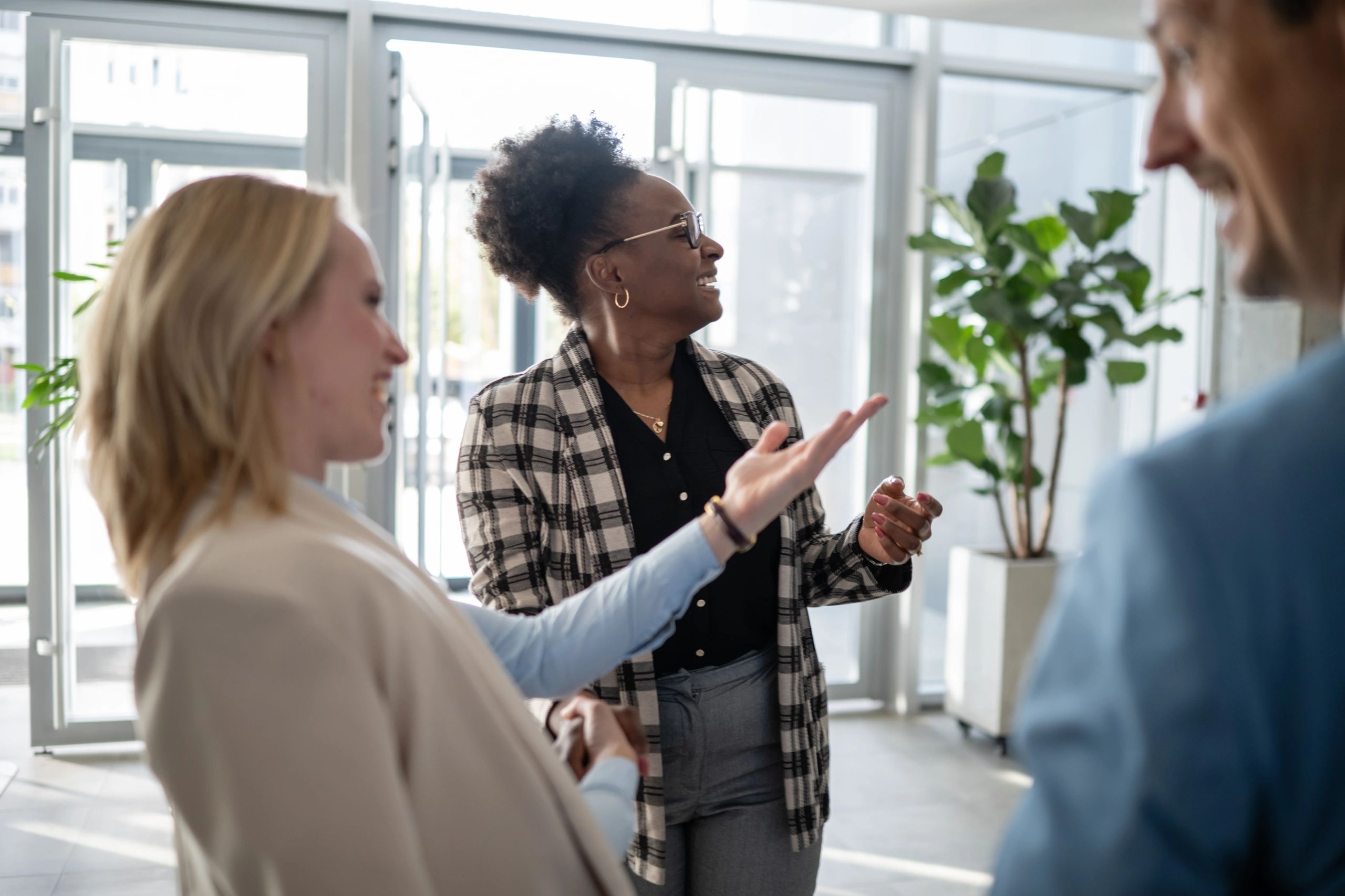 Business colleagues smiling during a conversation