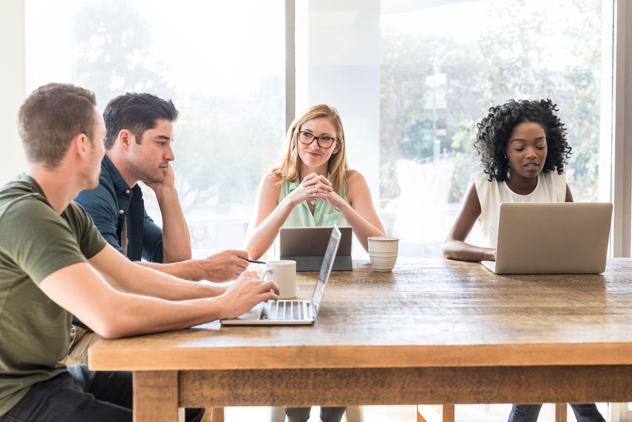 Person in a meeting setting, representing a reader testimonial