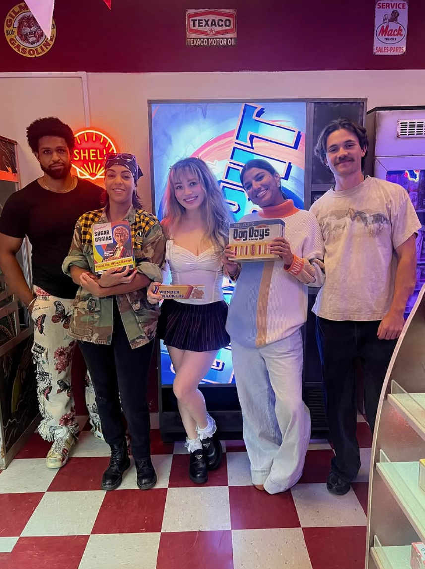 Friends posing inside Route 51 alien escape room at PanIQ Room West Hollywood